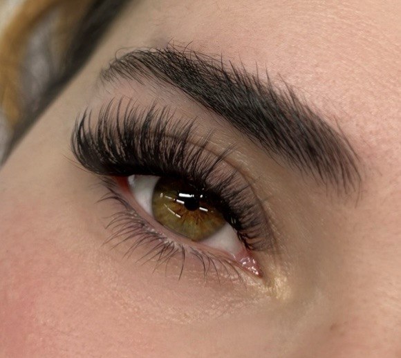 Woman with premium eyelash extensions at London Lash Lounge in Hammersmith