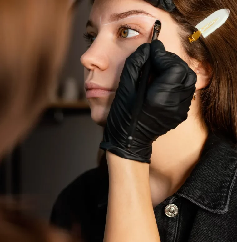 side-view-woman-getting-eyebrow-treatment-from-specialist (1)